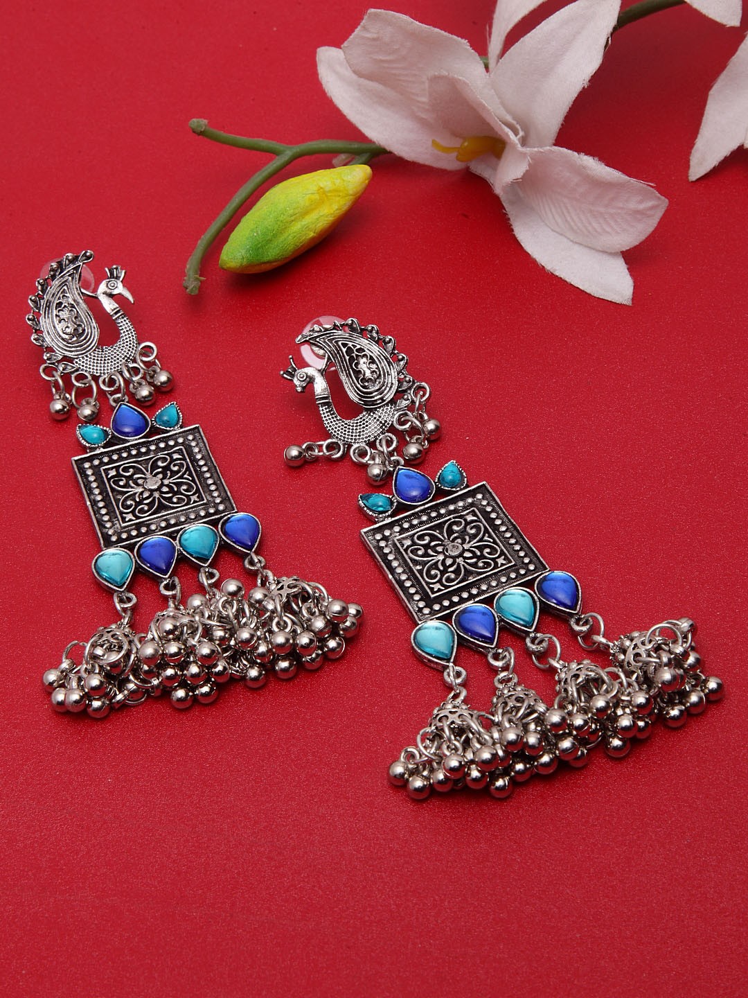 

Moedbuille Silver & Blue Handcrafted Peacock Shaped Drop Earrings