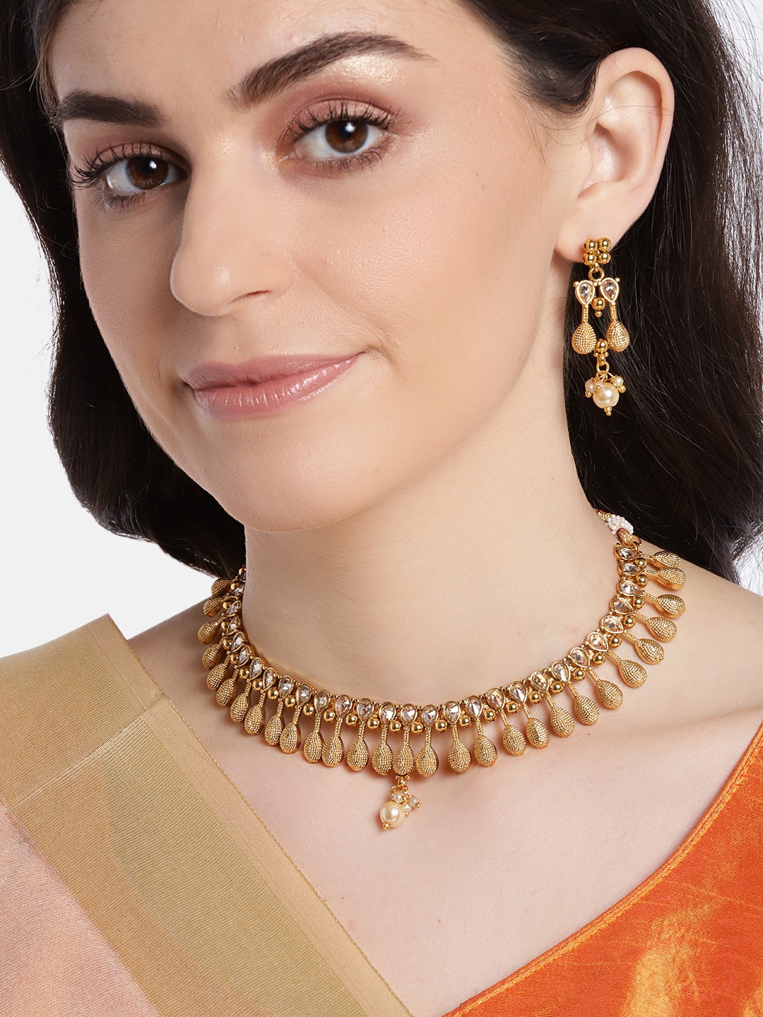 

JEWELS GEHNA Gold-Plated AD-Studded & Beaded Handcrafted Jewellery Set