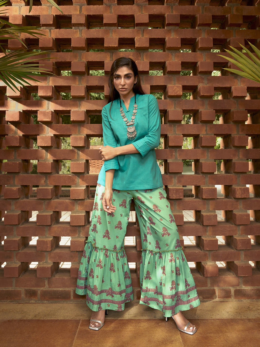 

Global Desi Women Sea Green & Maroon Printed Flared Palazzos