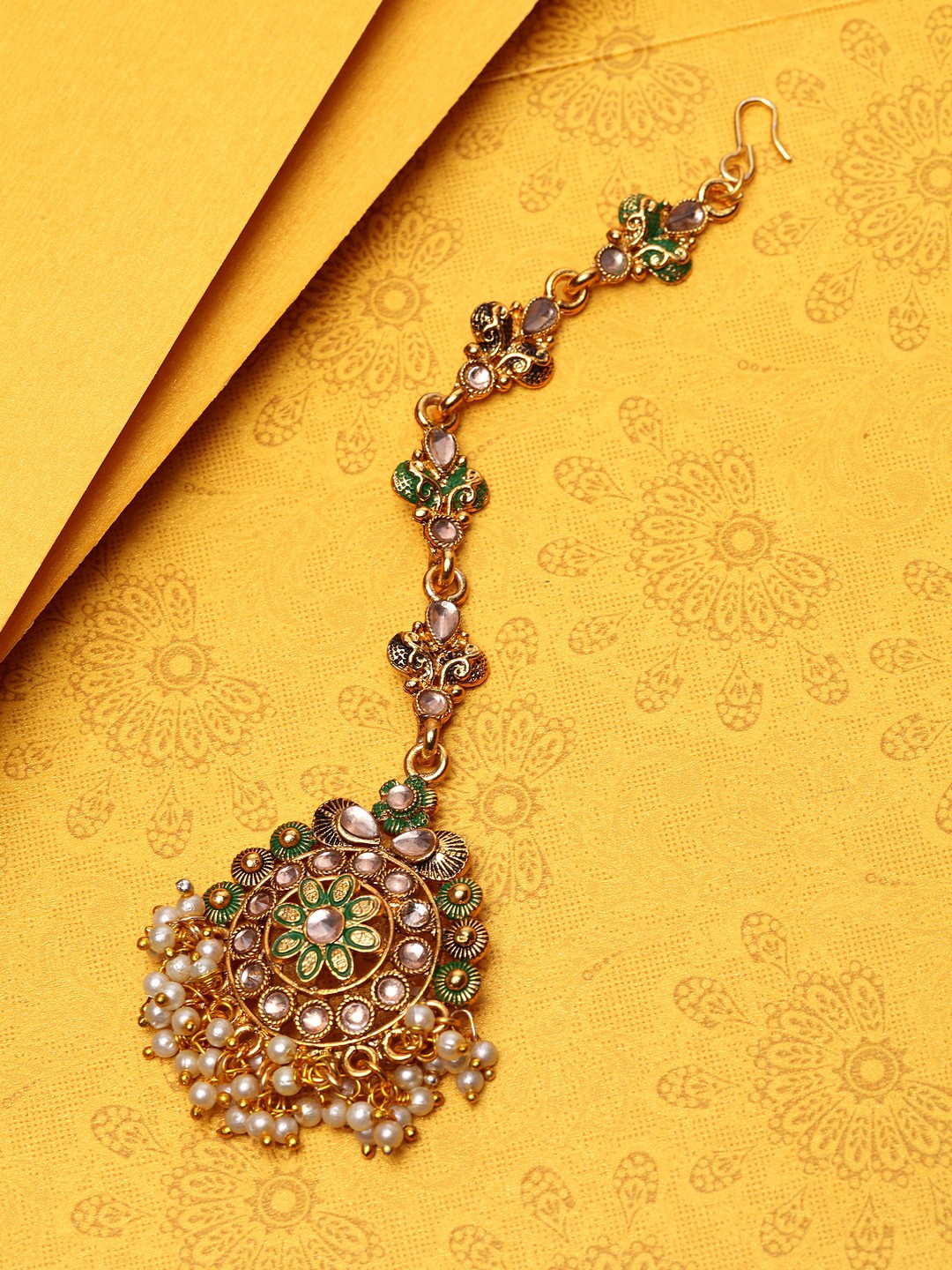 

ANIKAS CREATION Gold-Plated Green & White Kundan-Studded Pearl Embellished Enamelled Hand-Painted Maang Tikka