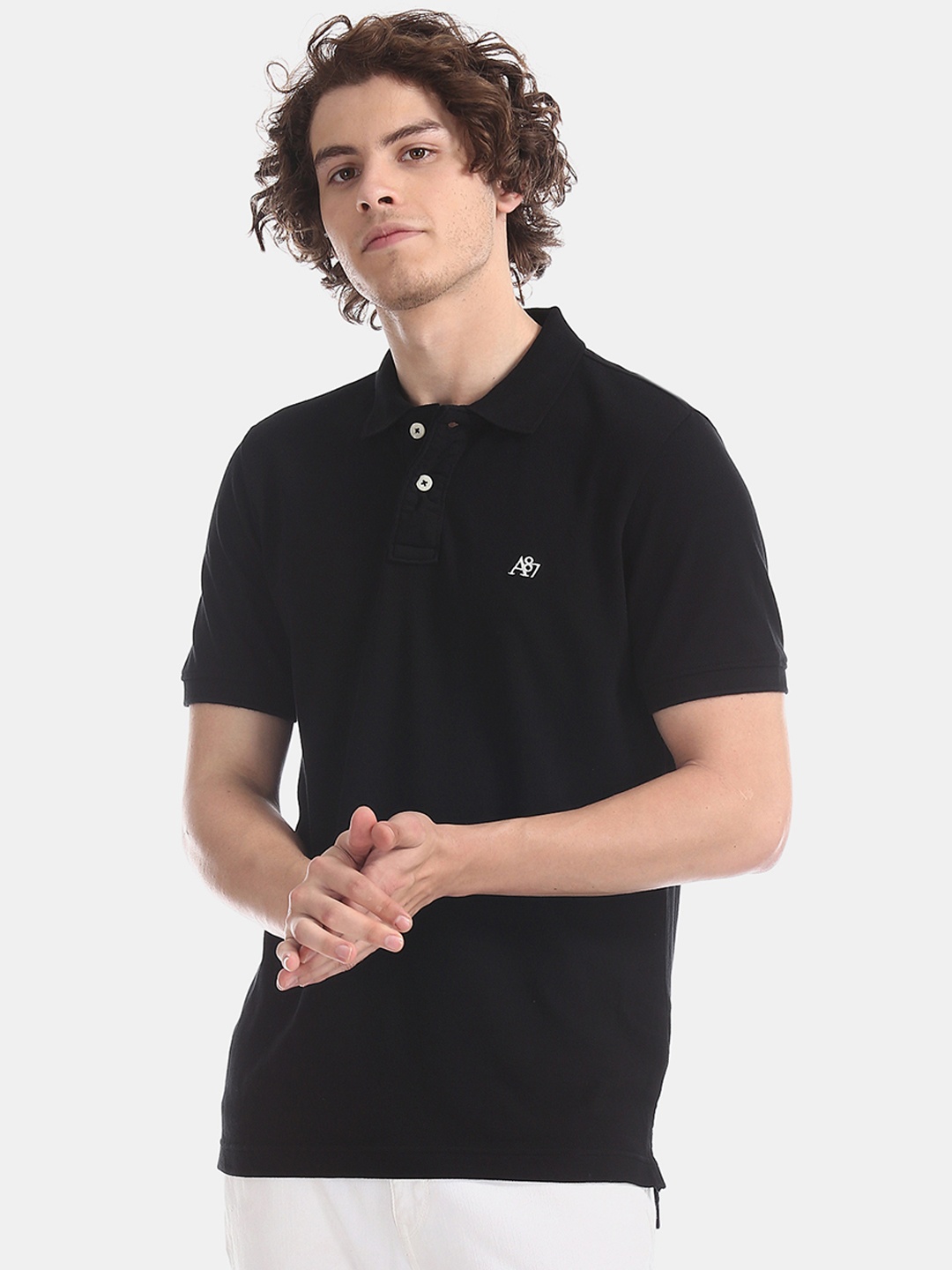 

Aeropostale Men Black Solid Polo Collar Pure Cotton T-shirt