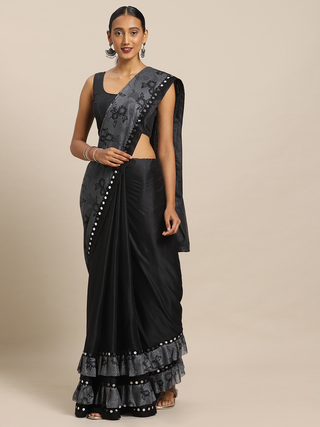 

Mirchi Fashion Black & Grey Polyester Solid Saree with Embellishment and Ruffles