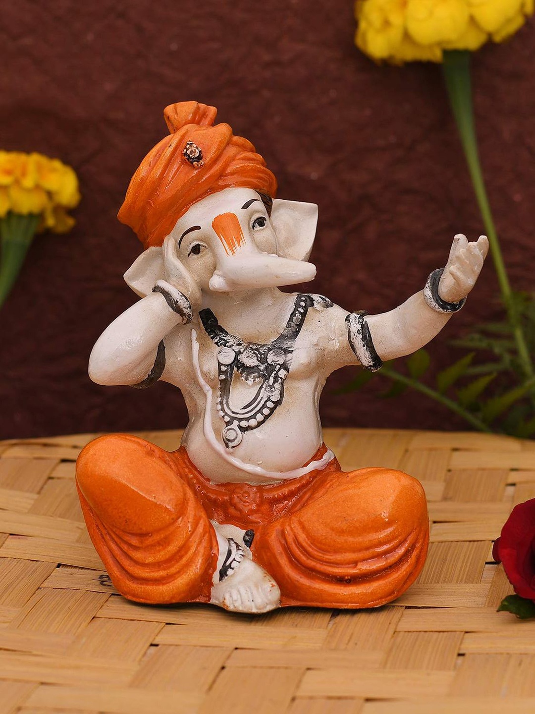 

CraftVatika Orange & White Handcrafted Lord Ganesha Singing Idol Showpiece