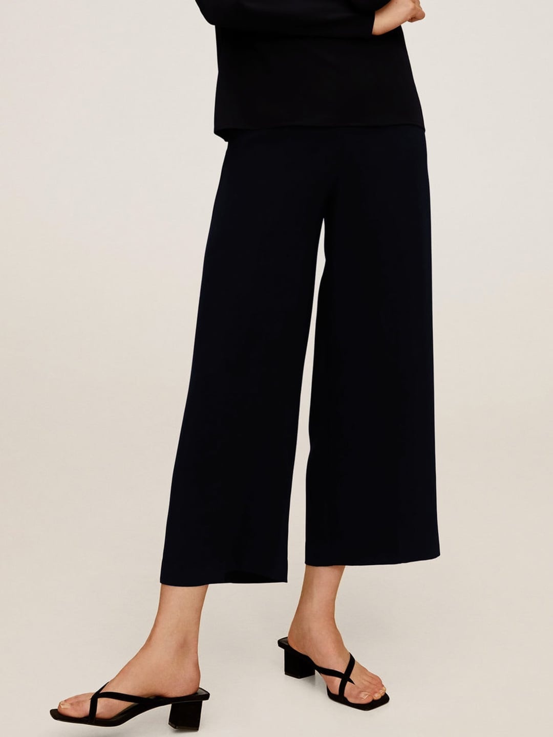 

MANGO Women Black Regular Fit Solid Cropped Parallel Sustainable Trousers