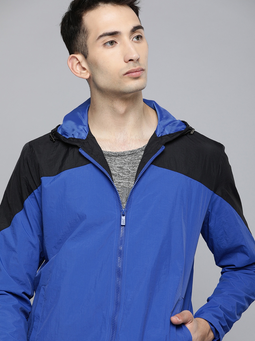 

HRX by Hrithik Roshan Men Blue & Black Colourblocked Rapid-Dry Lifestyle Jacket