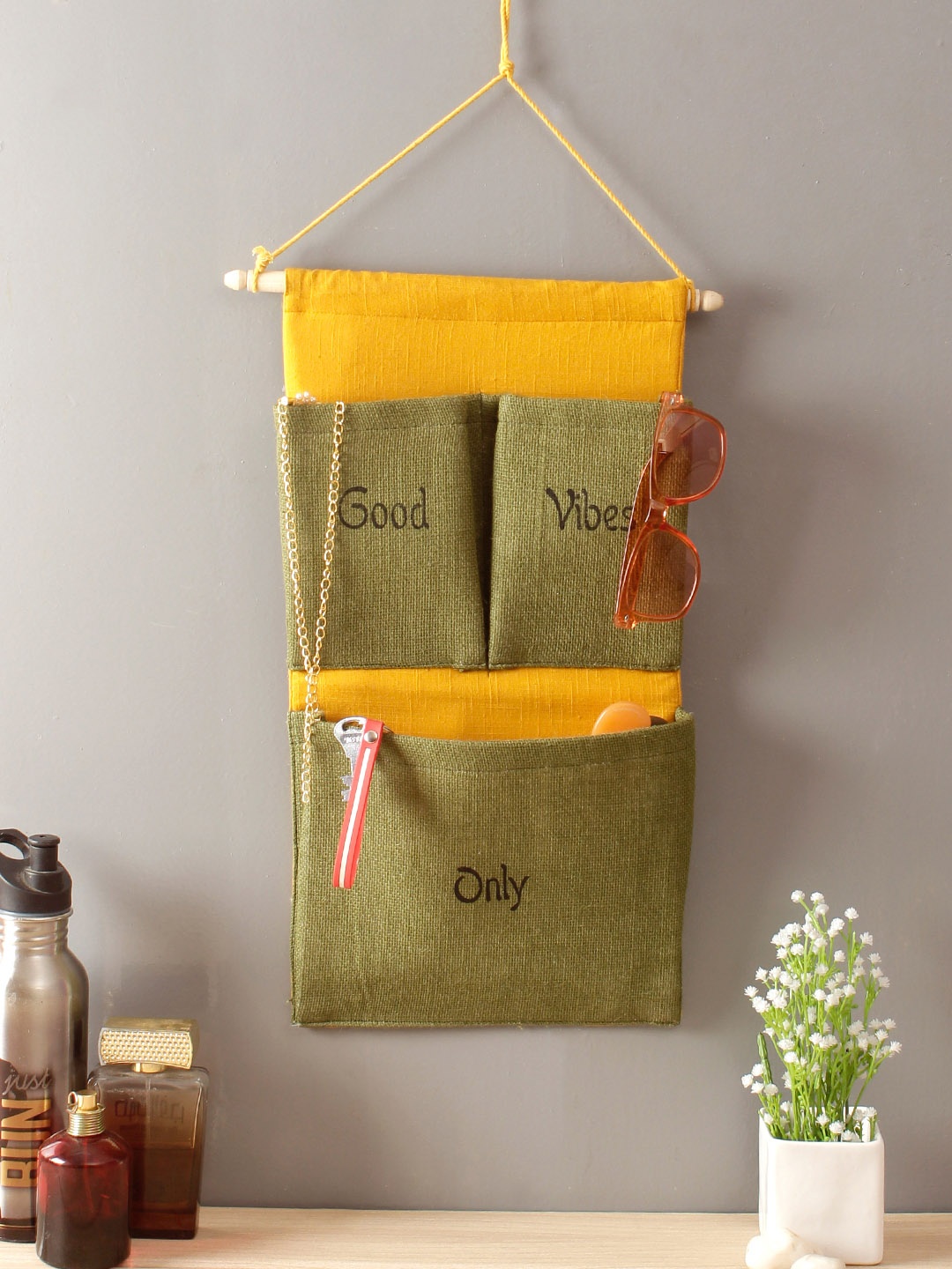 

Rajasthan Decor Yellow & Green Solid Multipurpose Wall Hanging Organizer