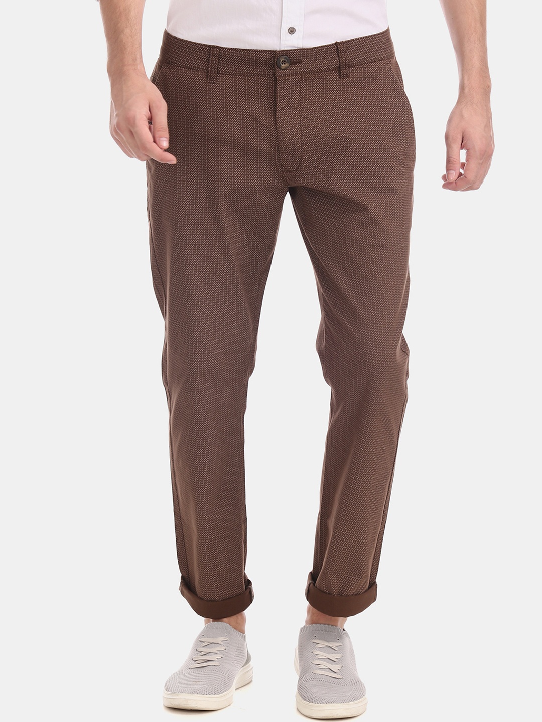 

Ruggers Men Brown Tapered Fit Self Design Regular Trousers