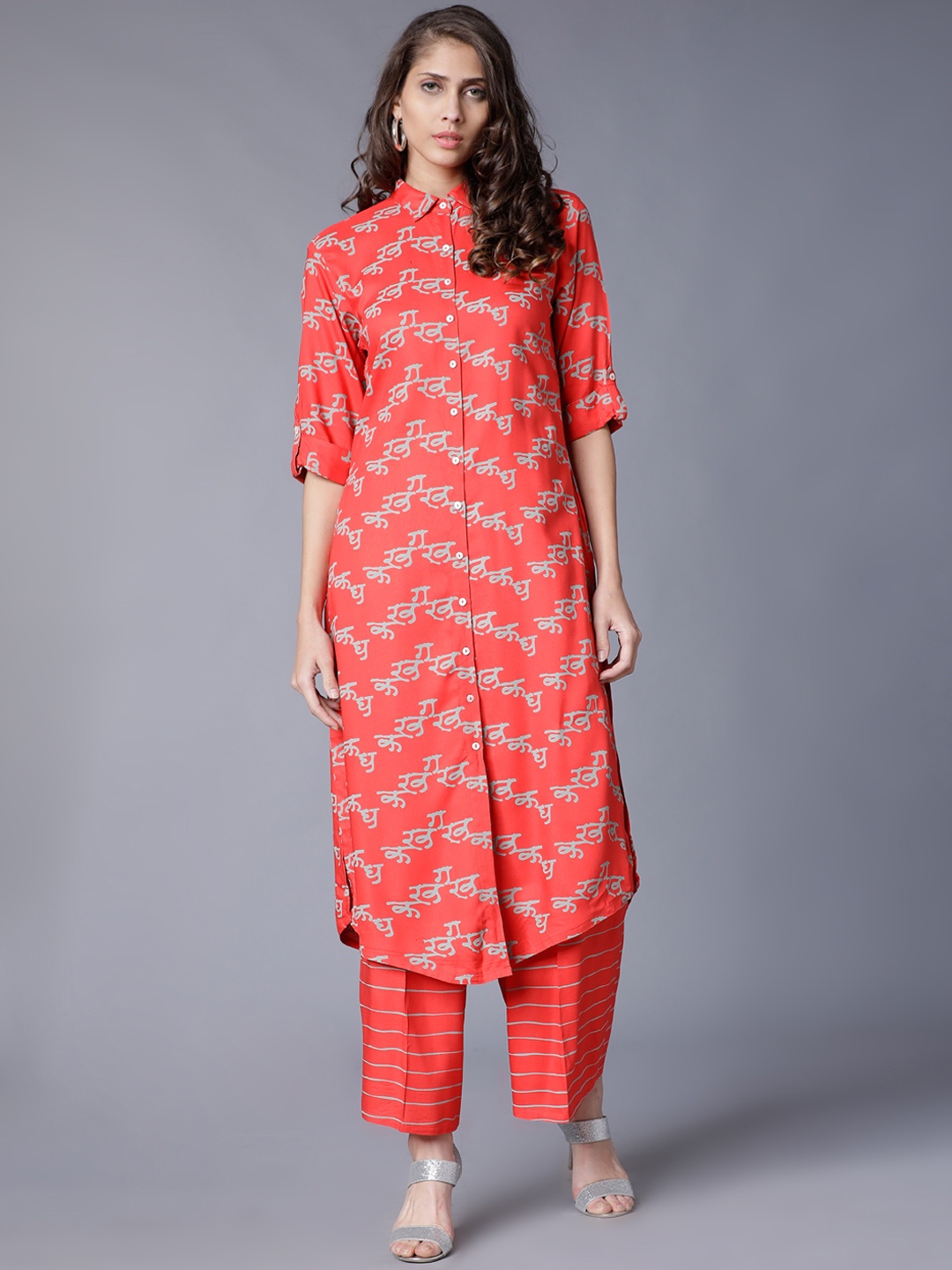 

Vishudh Women Orange & Grey Printed Kurta with Palazzos