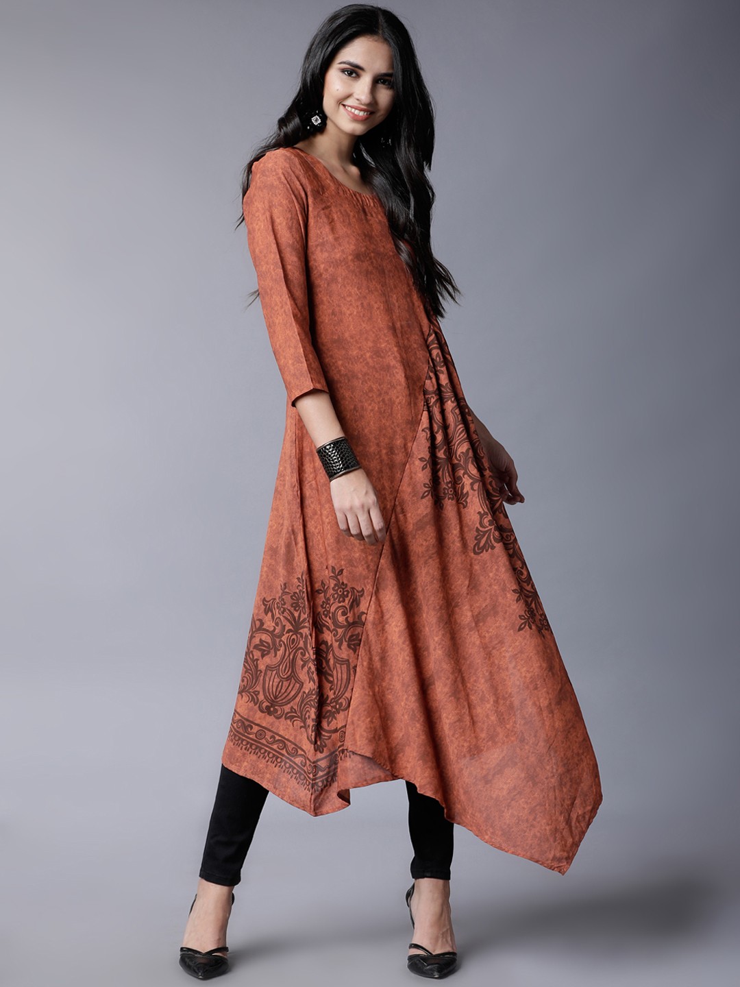 

Vishudh Women Brown Asymmetric Hem Printed A-Line Kurta