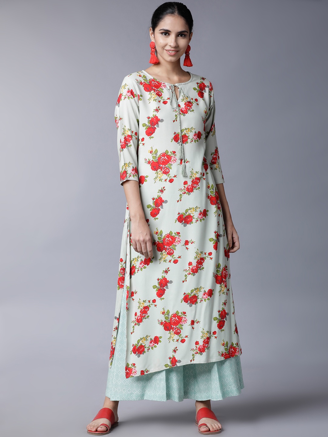 

Vishudh Women Turquoise Blue & Red Printed Kurta with Palazzos
