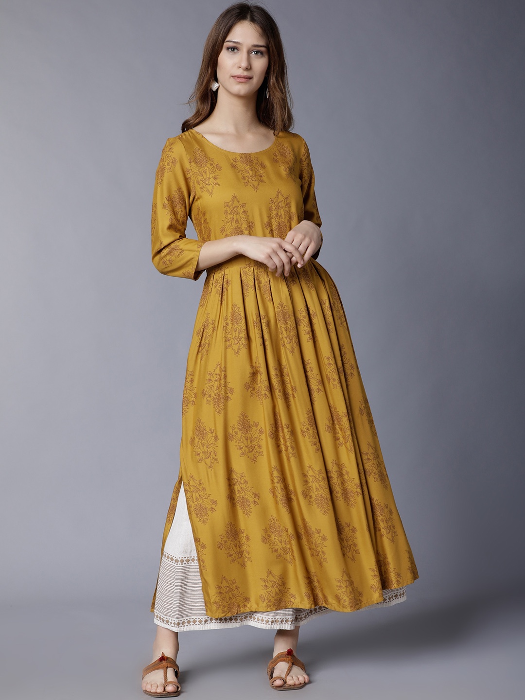 

Vishudh Women Mustard Floral Printed A-Line Kurta
