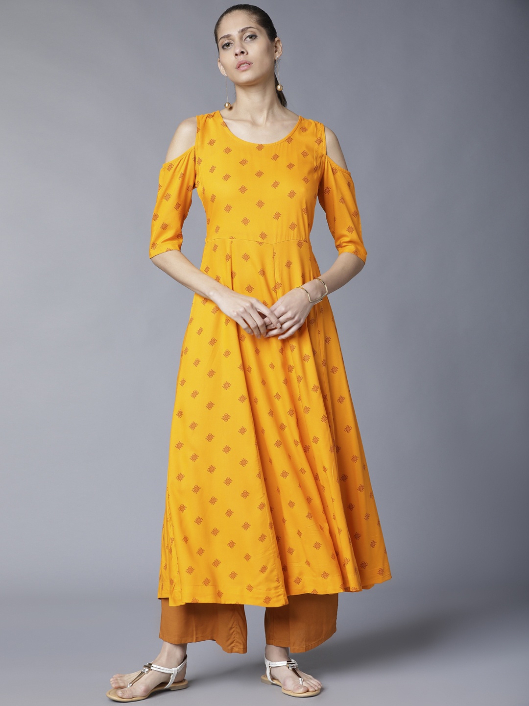 

Vishudh Women Yellow Printed A-Line Kurta