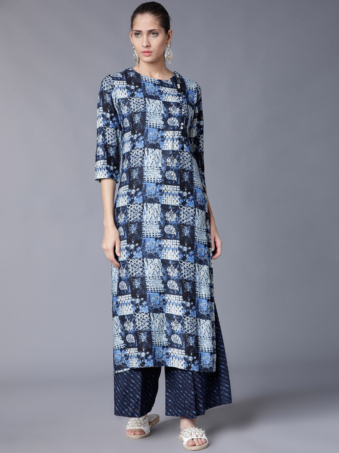 

Vishudh Women Blue Printed Regular Kurta with Palazzos
