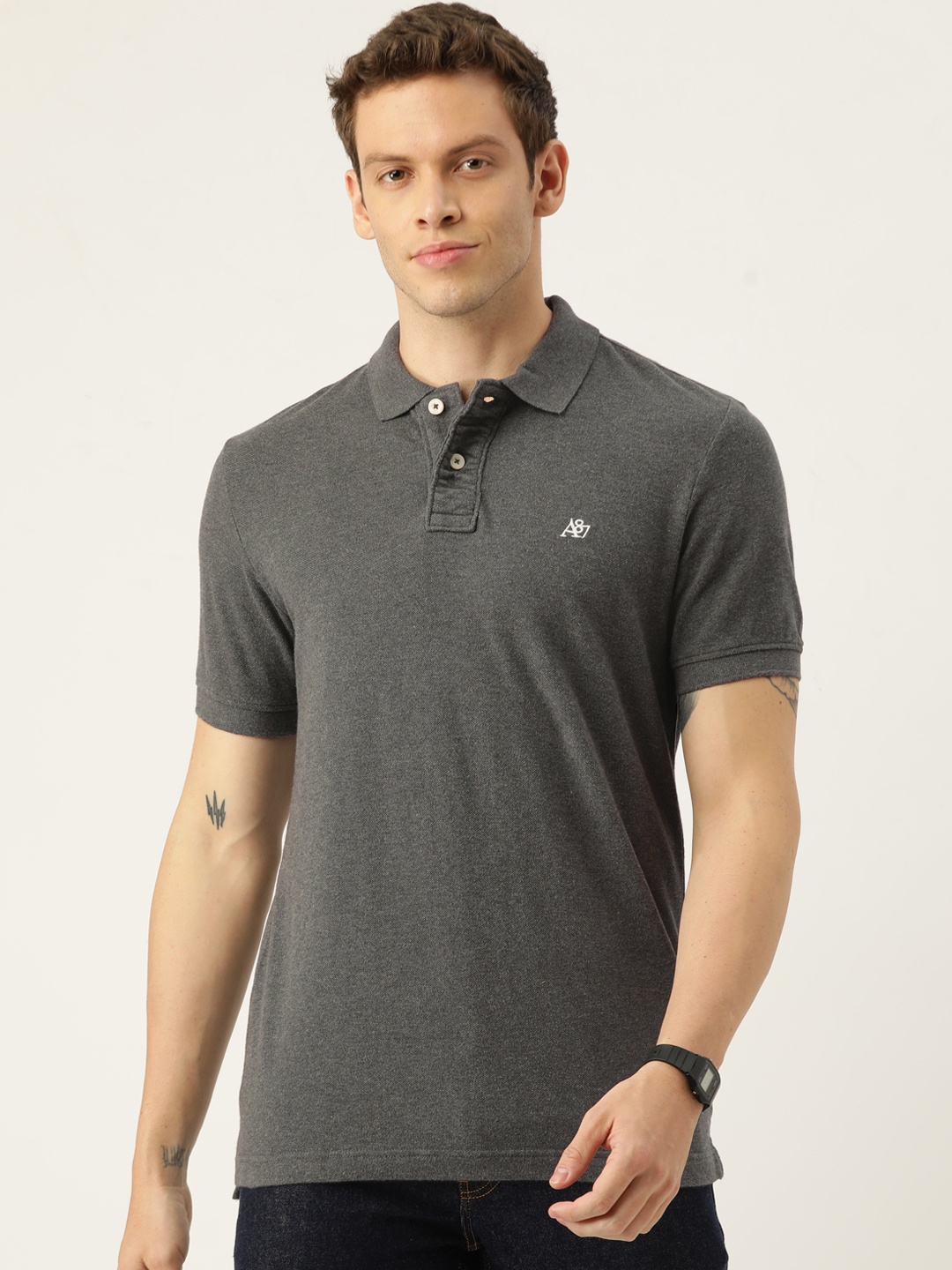 

Aeropostale Men Pure Cotton Charcoal Solid Melange Effect Polo Collar T-shirt