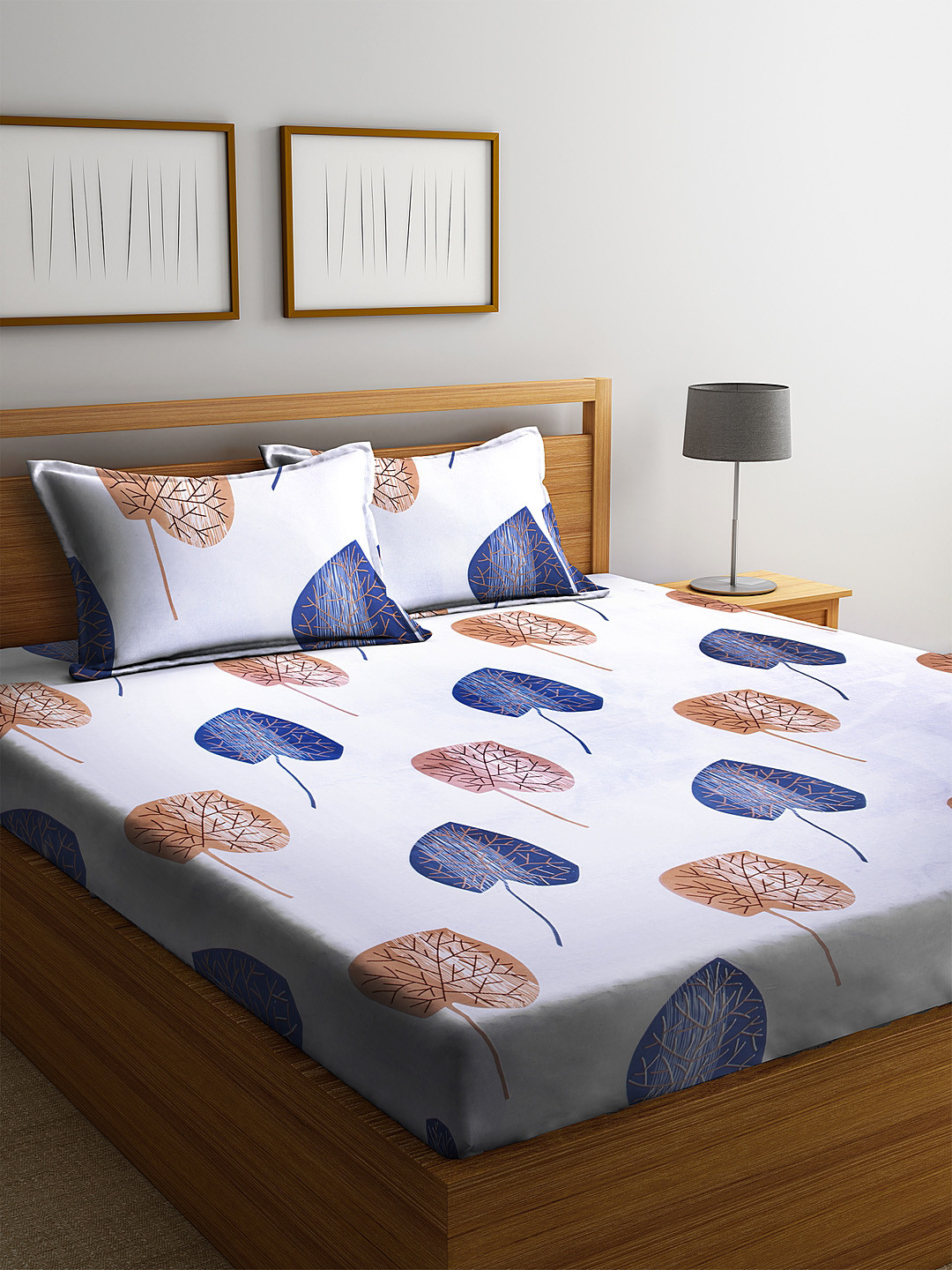

Home Sizzler Off-White & Blue Abstract 144 TC Polyester 1 Queen Bedsheet with 2 Pillow Covers