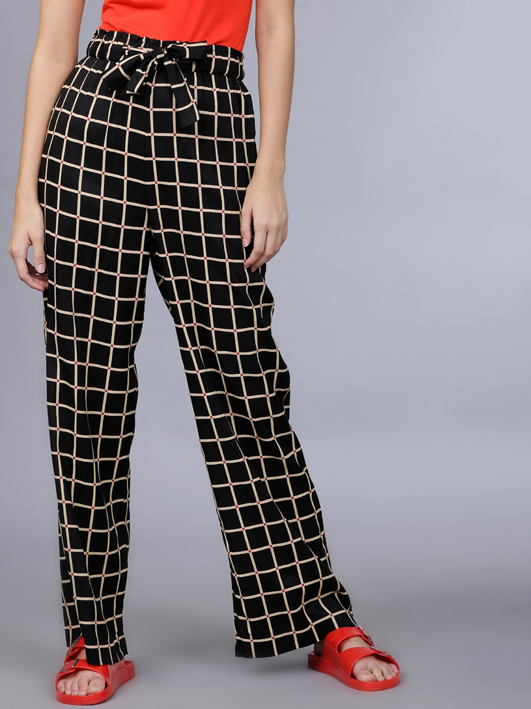 

Tokyo Talkies Women Black & Beige Loose Fit Checked Peg Trousers