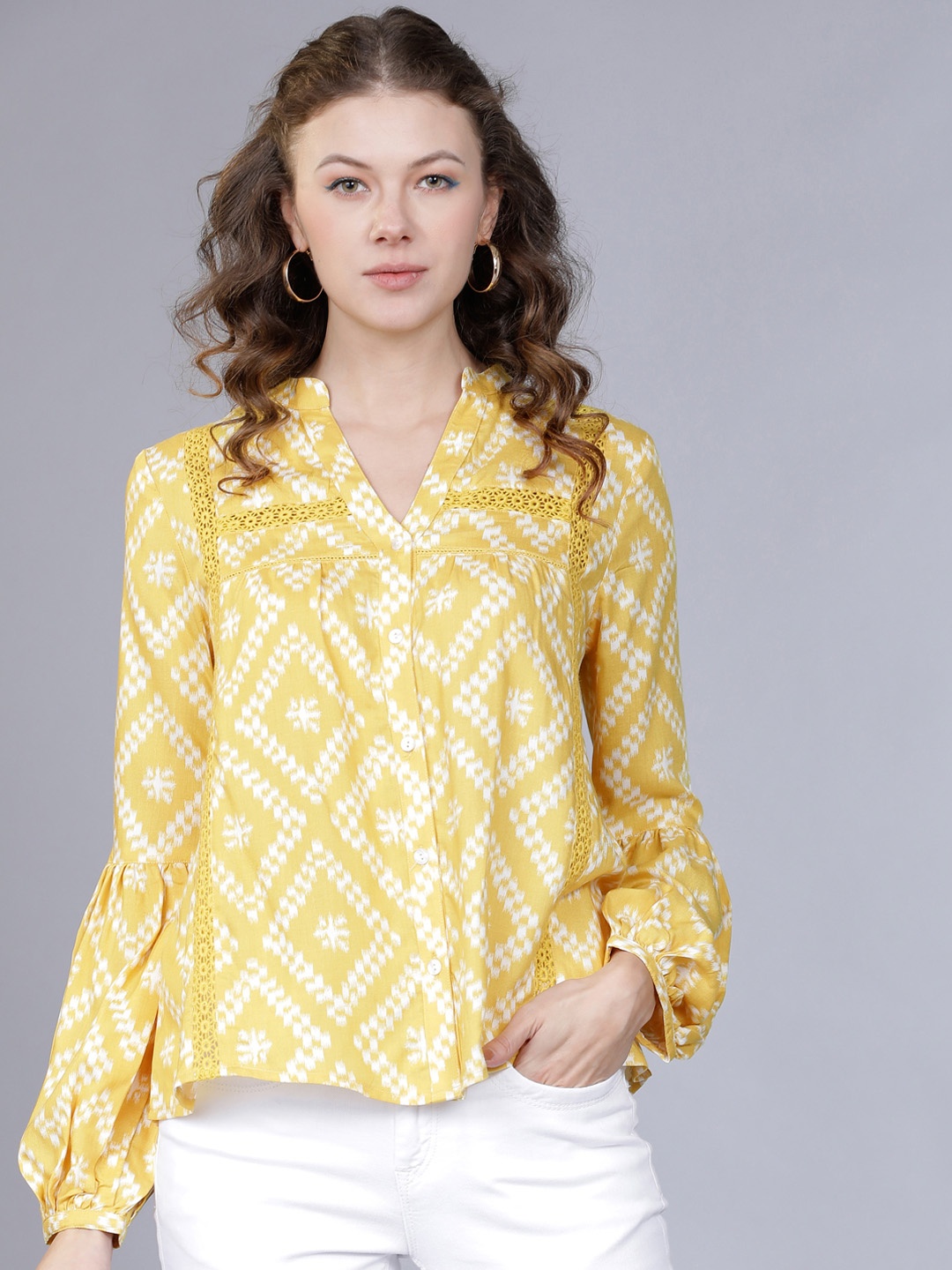 

Vishudh Women Yellow Printed A-Line Top