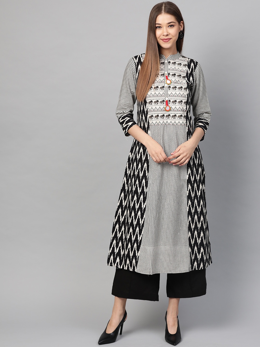 

Laado - Pamper Yourself Women Off-White & Black Printed A-Line Sustainable Kurta