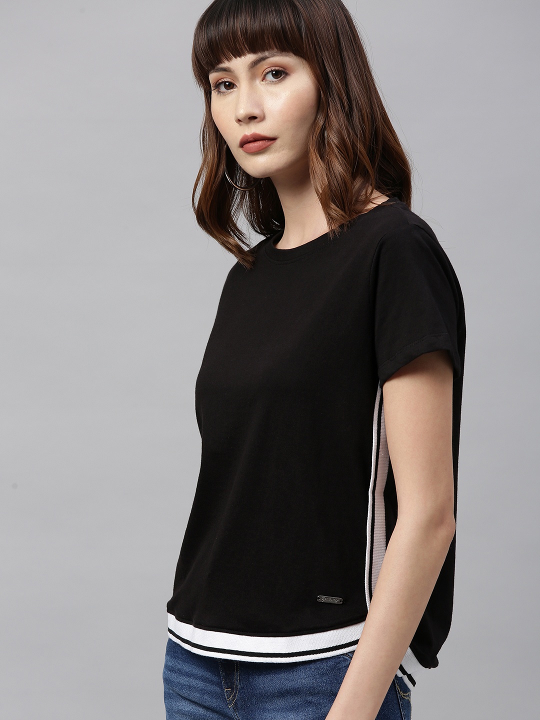 

Roadster Women Black Solid Round Neck Pure Cotton T-shirt with Curved Hem