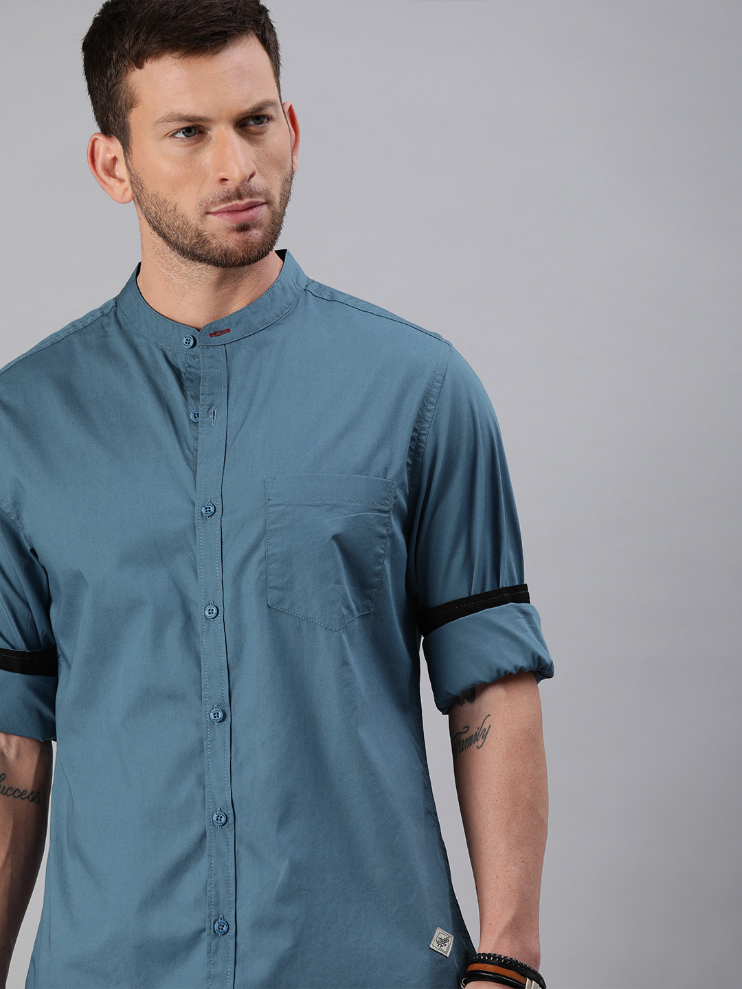 

Roadster Men Teal Blue Regular Fit Solid Casual Shirt