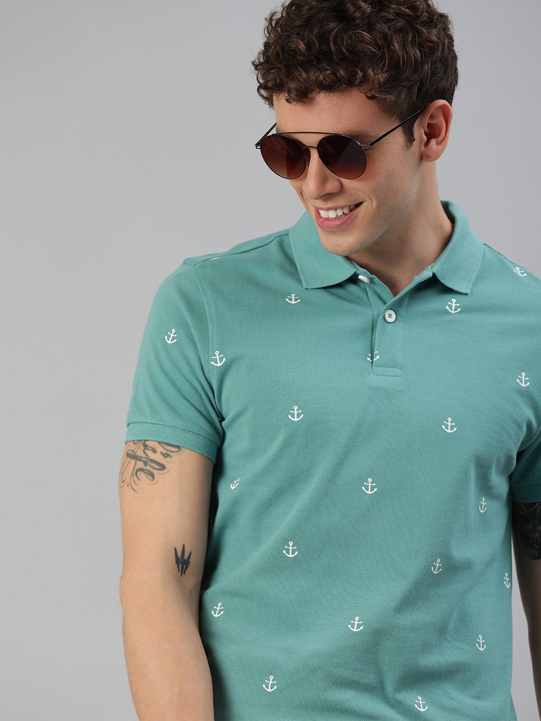 

Mast & Harbour Men Teal Blue & White Printed Polo Collar T-shirt
