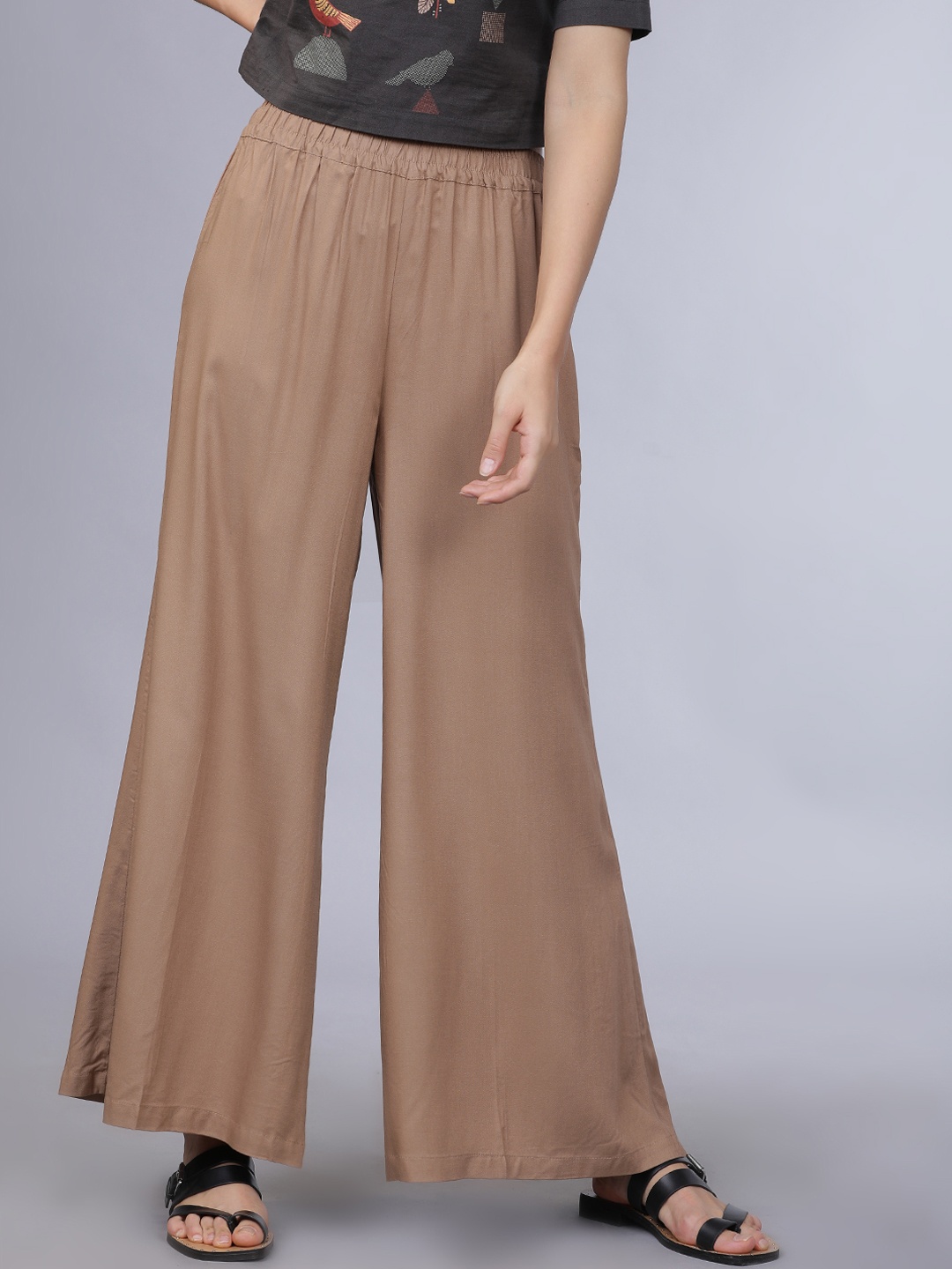 

Vishudh Women Brown Solid Straight Palazzos