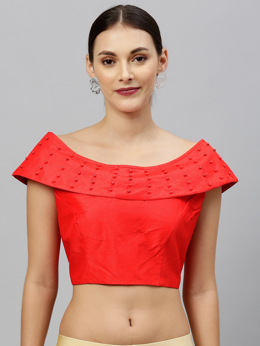 

Amrutam Fab Women Red Solid Boat Neck Blouse with Embellishments