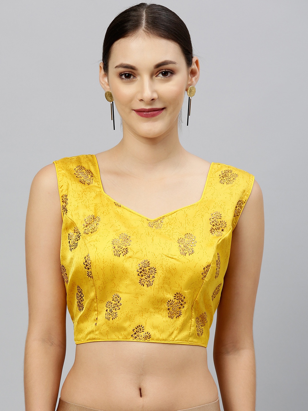 

Amrutam Fab Women Yellow & Golden Printed Styled Back Blouse with Tie-Ups