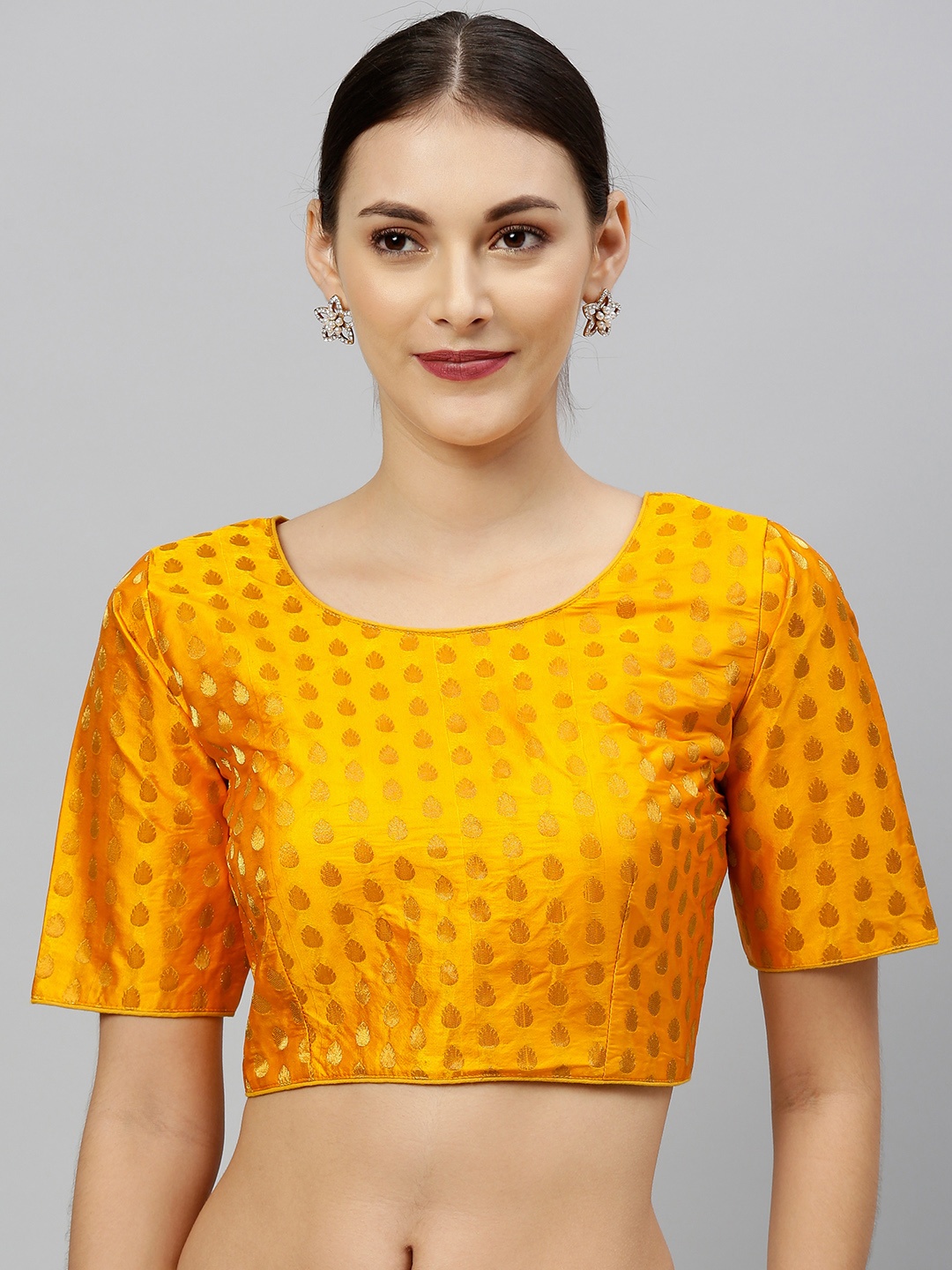 

Amrutam Fab Women Orange & Gold-Toned Woven Design Jacquard Blouse, Mustard