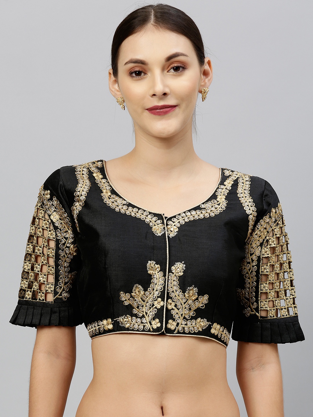 

Amrutam Fab Women Black & Golden Embroidered Pleated Blouse with Cut Outs