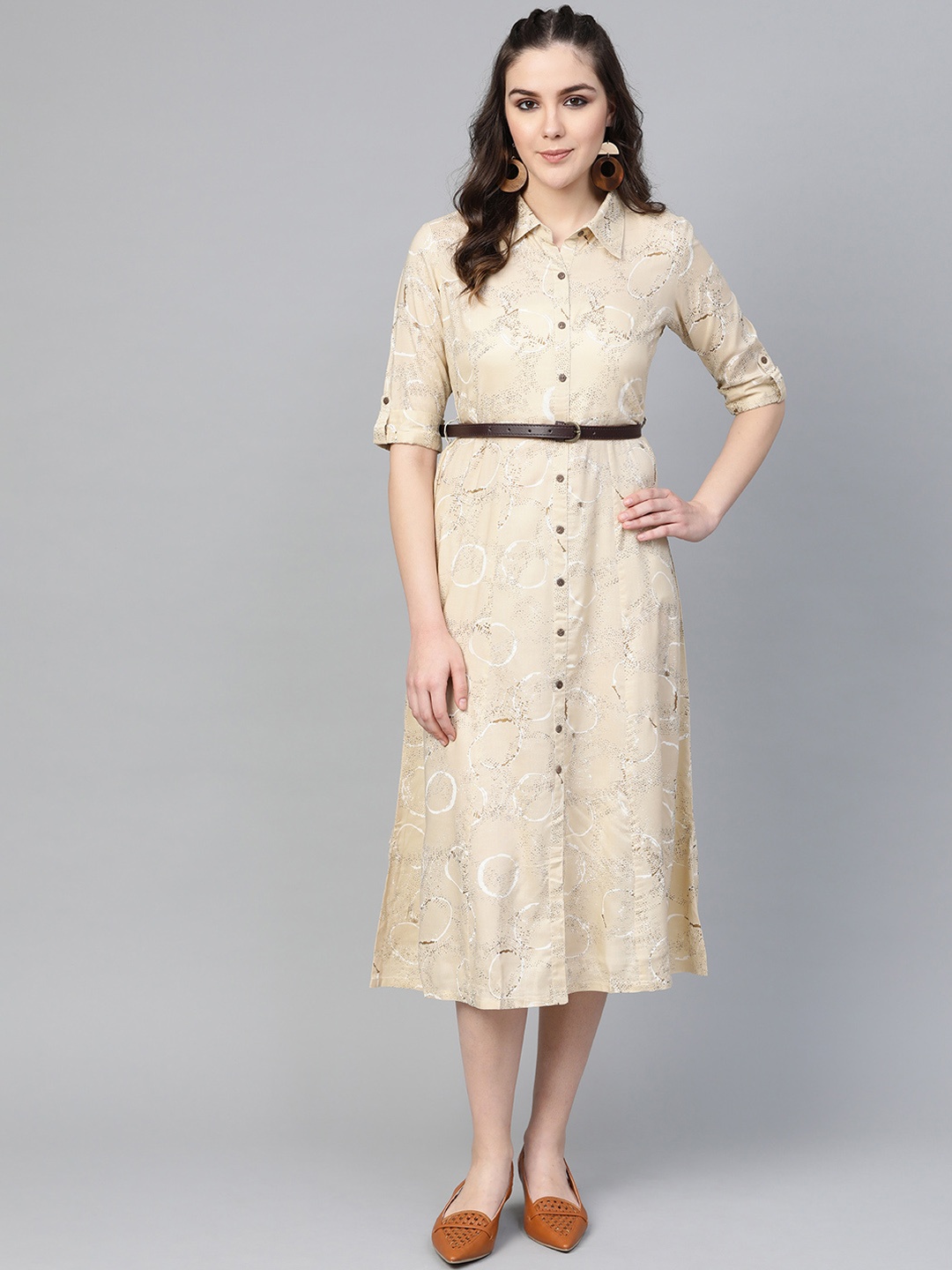 

Varanga Women Beige Printed Fit and Flare Dress