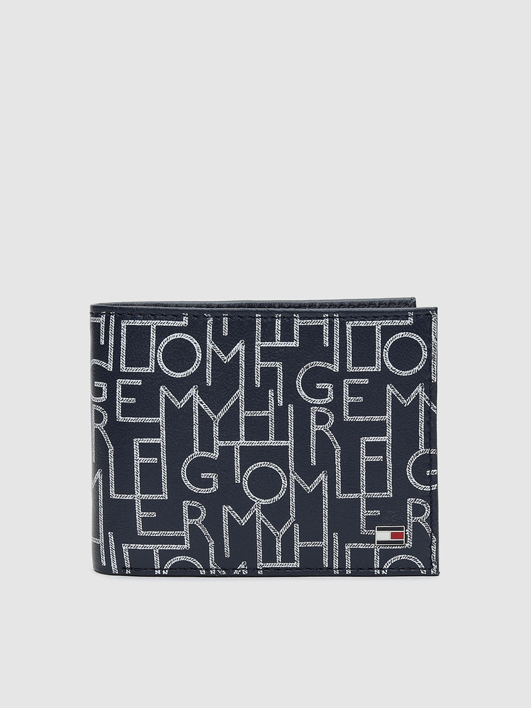 

Tommy Hilfiger Men Navy Blue & White Printed Two Fold Leather Wallet