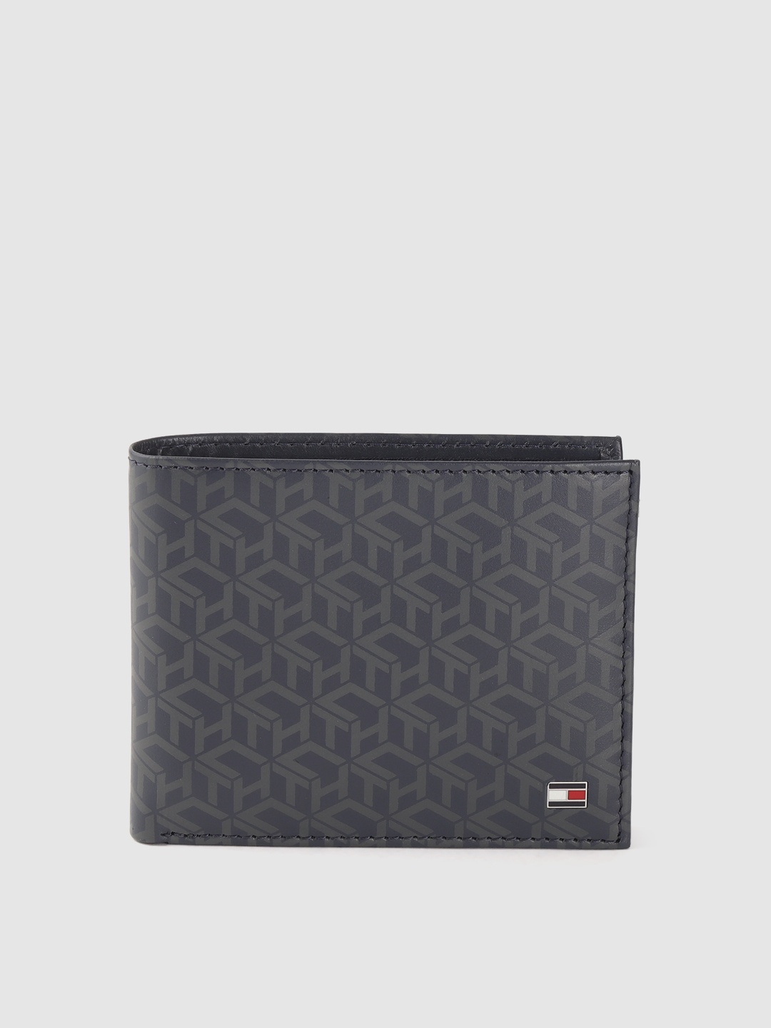 

Tommy Hilfiger Men Navy Blue & Grey Geometric Printed Leather Two Fold Wallet