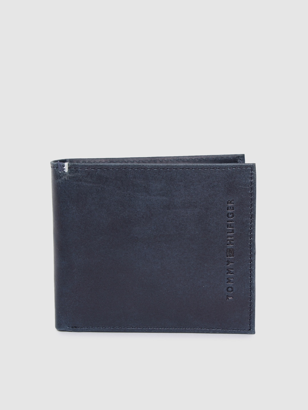 

Tommy Hilfiger Men Navy Blue Genuine Leather Two Fold Wallet