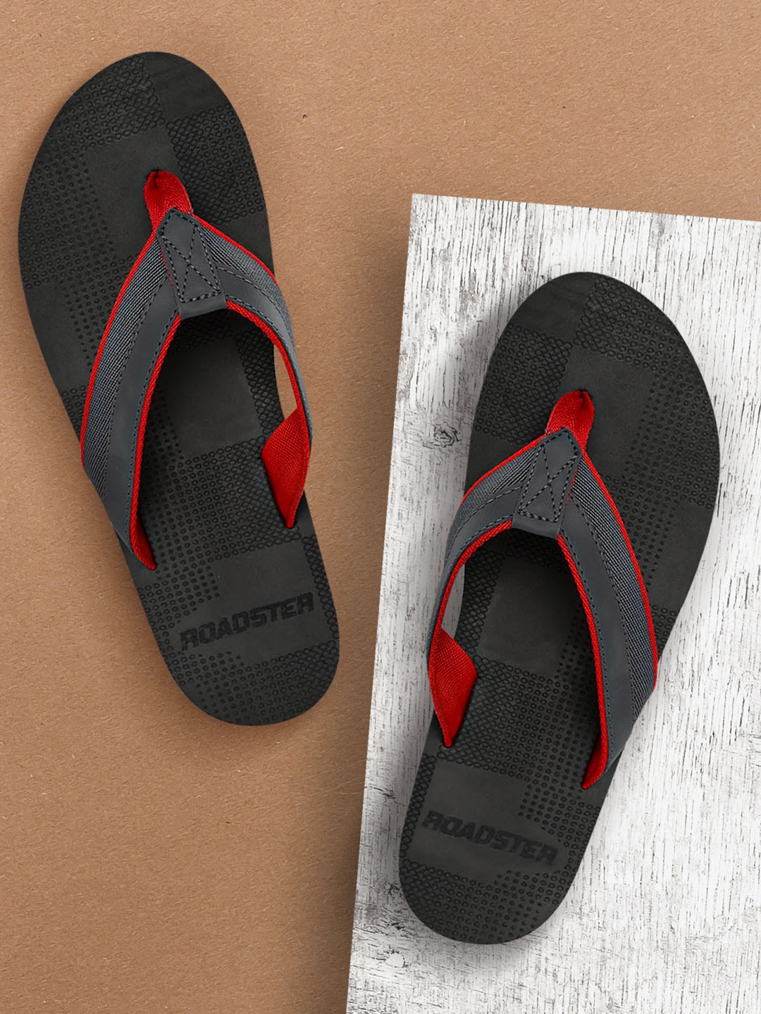 

Roadster Men Charcoal Grey Textured Thong Flip-Flops
