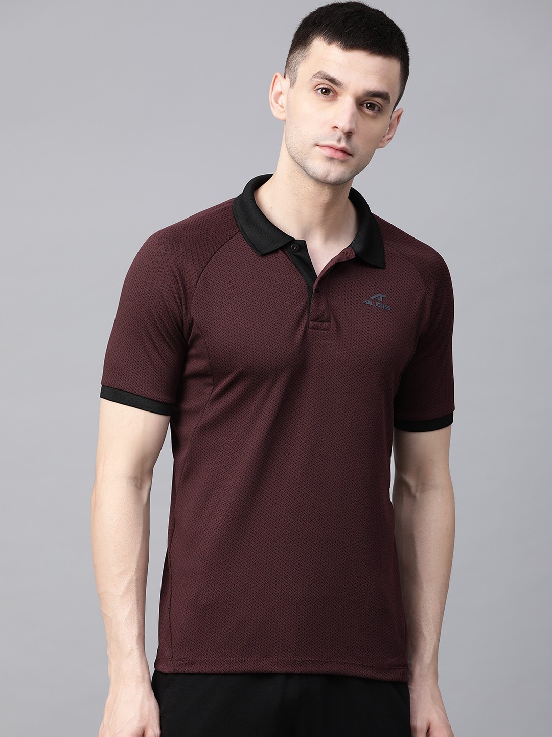 

Alcis Men Burgundy Self Design Polo Collar Training T-shirt