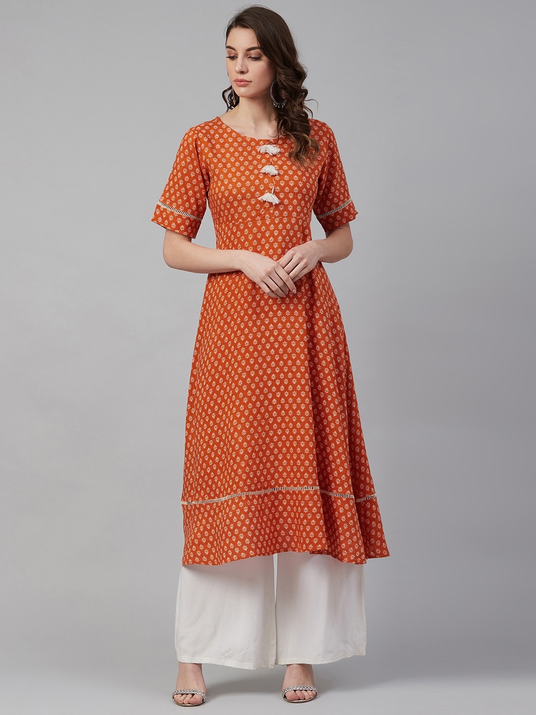 

Azira Women Rust Orange & Off-White Printed A-Line Kurta