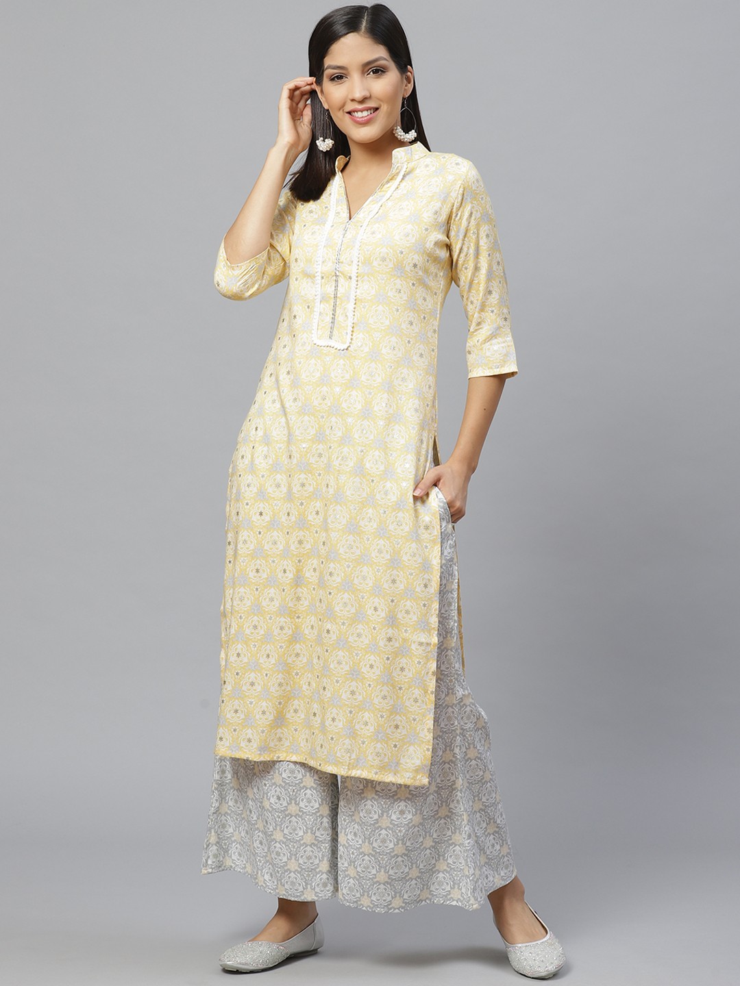 

Libas Women Yellow & Grey Printed Kurta with Palazzos