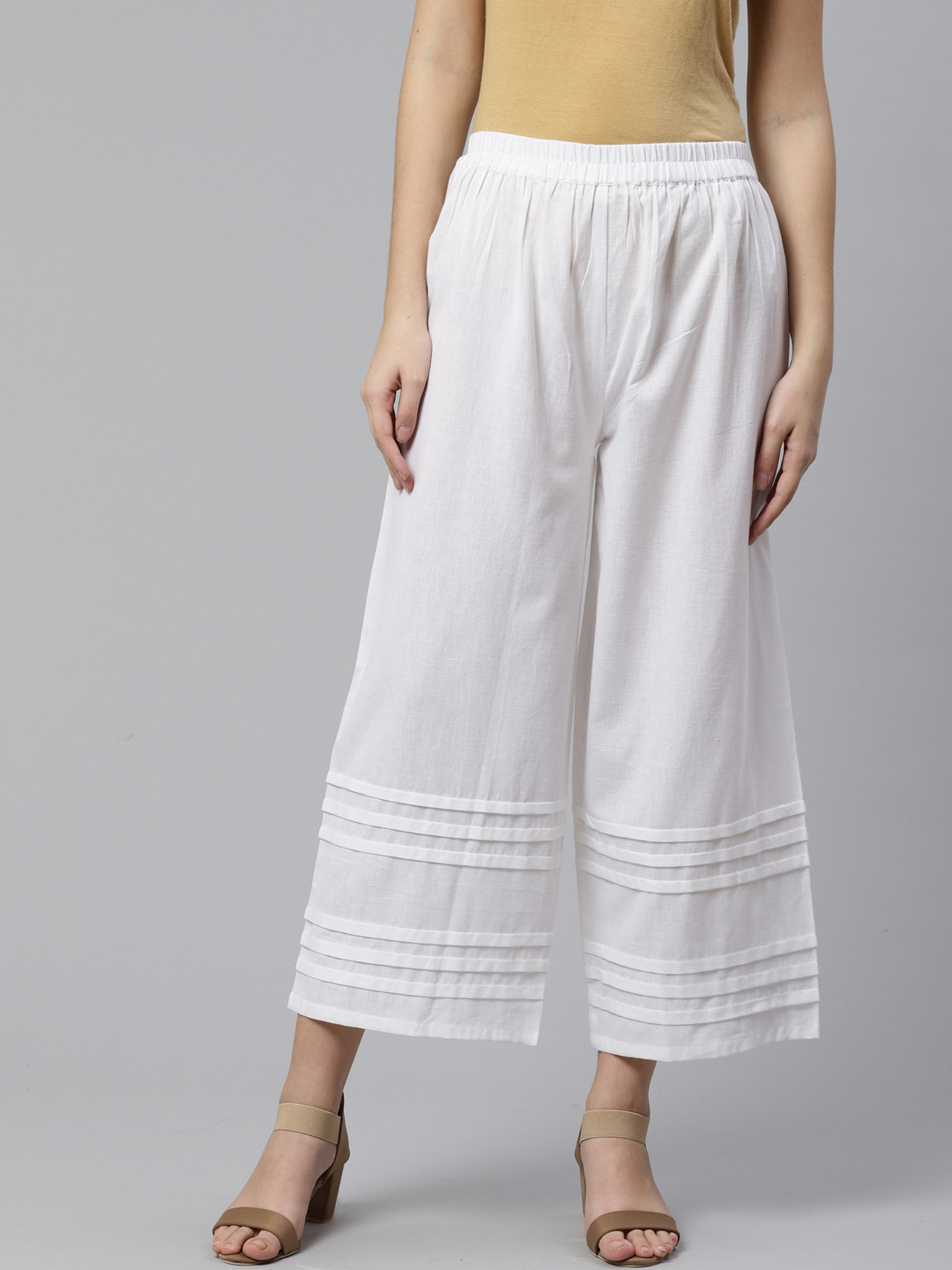 

Libas Women White Solid Straight Palazzos