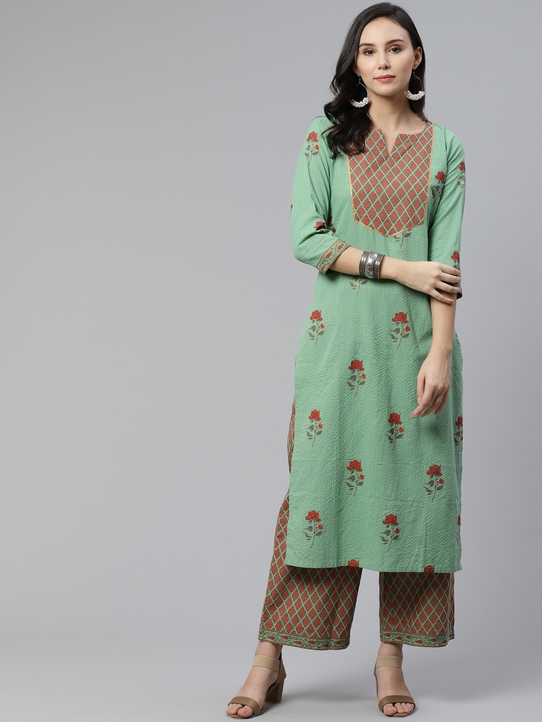 

Libas Women Green & Rust Red Printed Straight Kurta with Palazzo