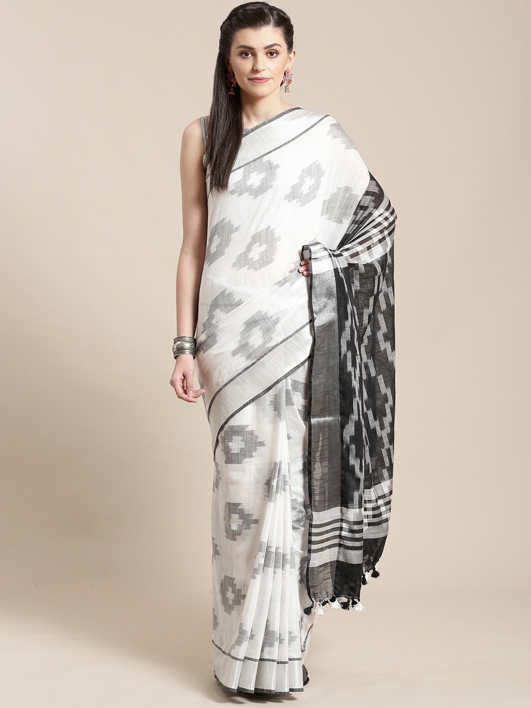 

Kalakari India White & Black Linen Handwoven Ikat Saree