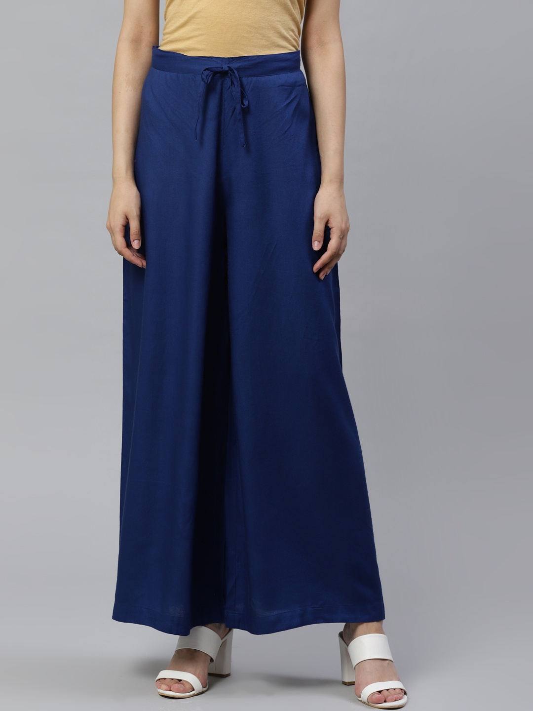 

YASH GALLERY Women Navy Blue Solid Flared Palazzos
