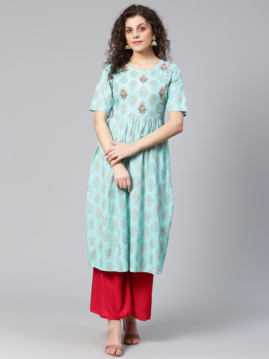 

Meeranshi Women Blue & Golden Printed A-Line Kurta