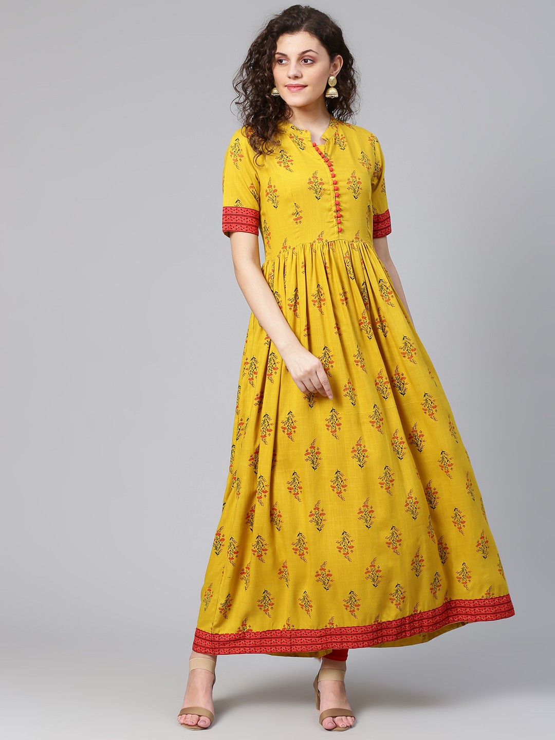 

Meeranshi Women Mustard Yellow & Red Printed A-Line Kurta