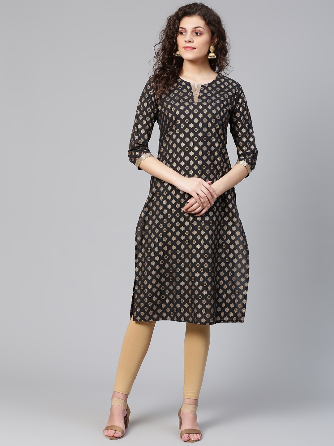 

Meeranshi Women Black & Golden Ethnic Printed Straight Kurta
