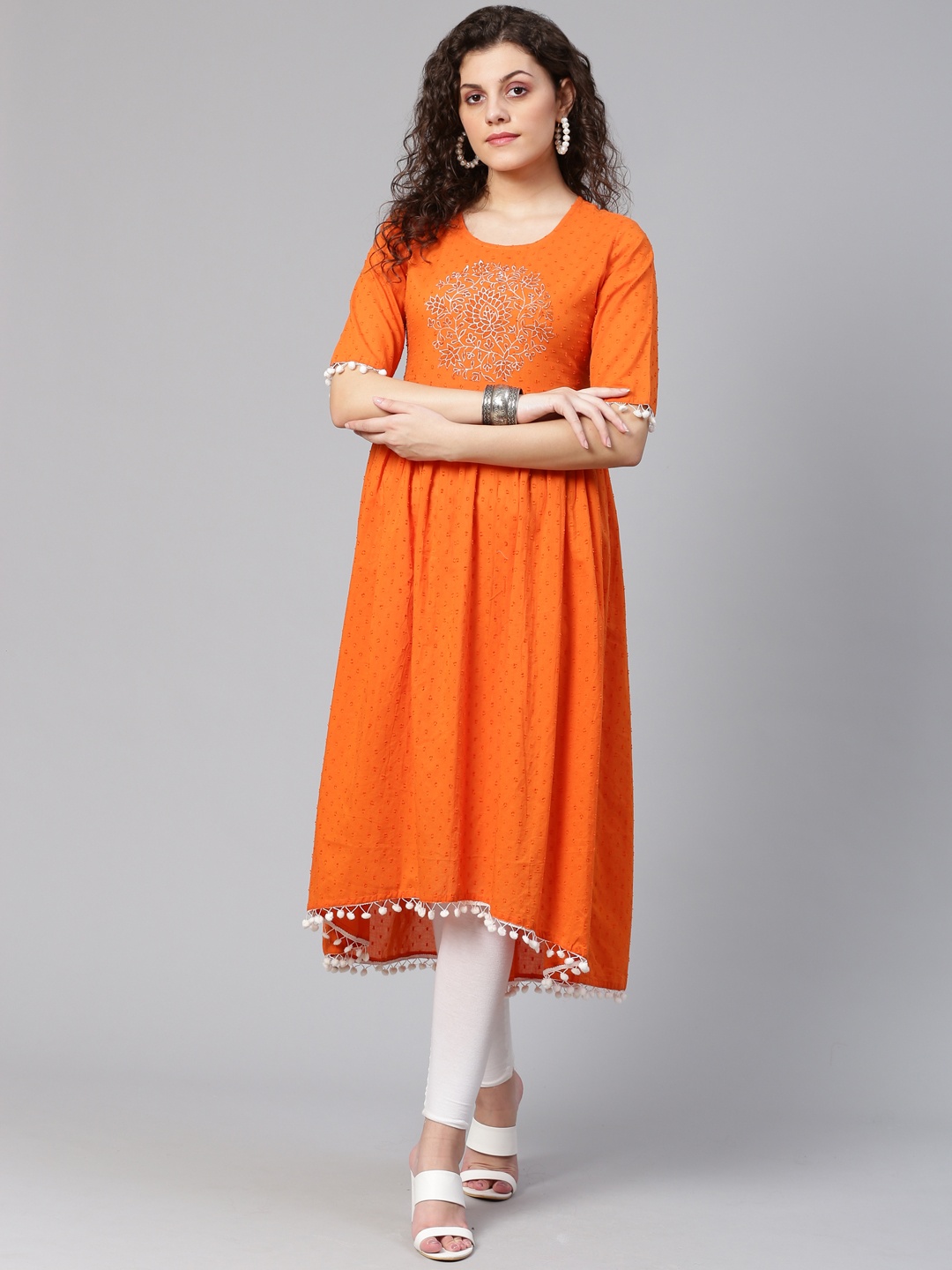 

Meeranshi Women Orange Pom-Pom Detail Woven Design High-Low A-Line Kurta