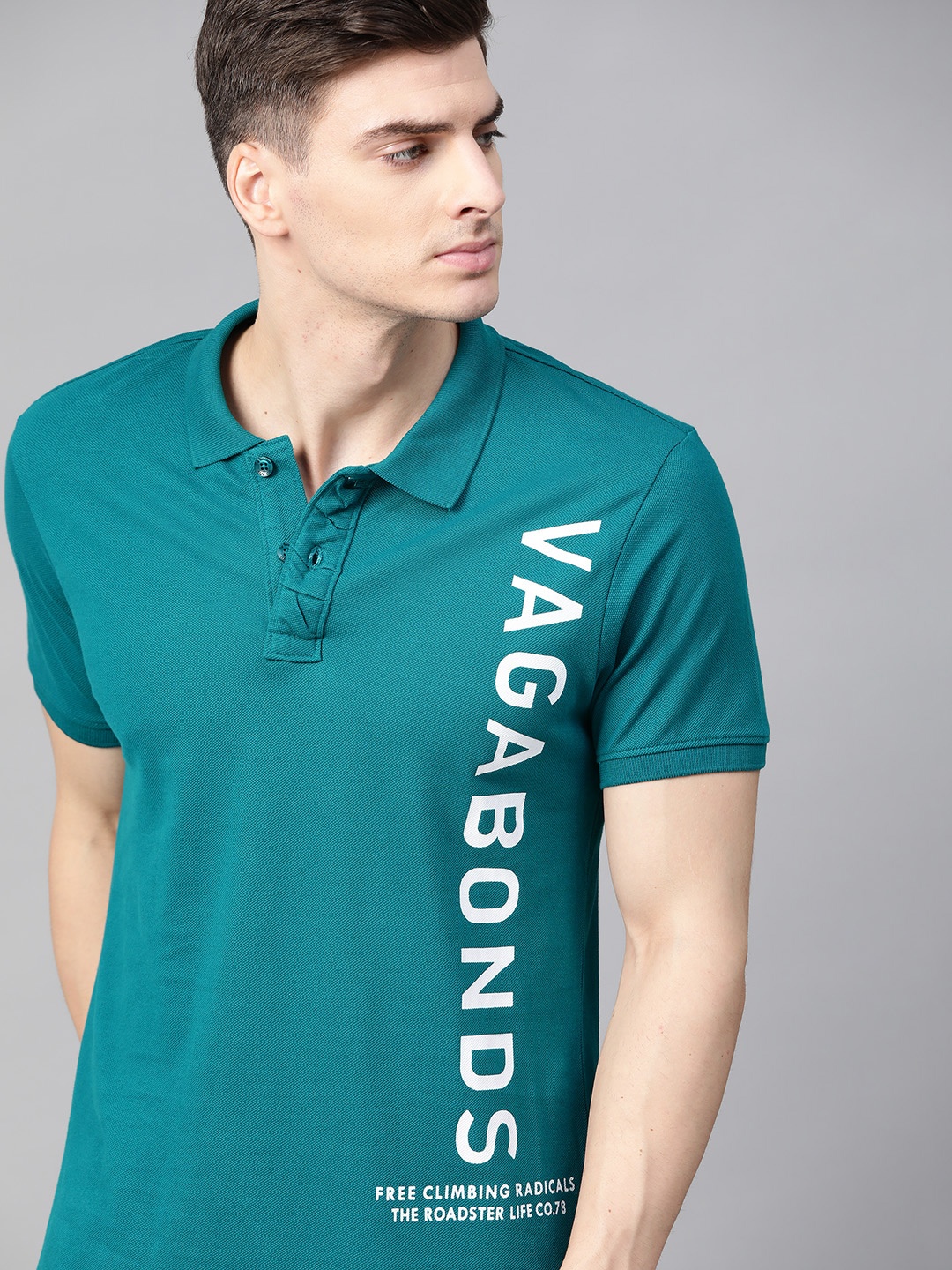 

Roadster Men Teal Blue & White Printed Polo Collar T-shirt