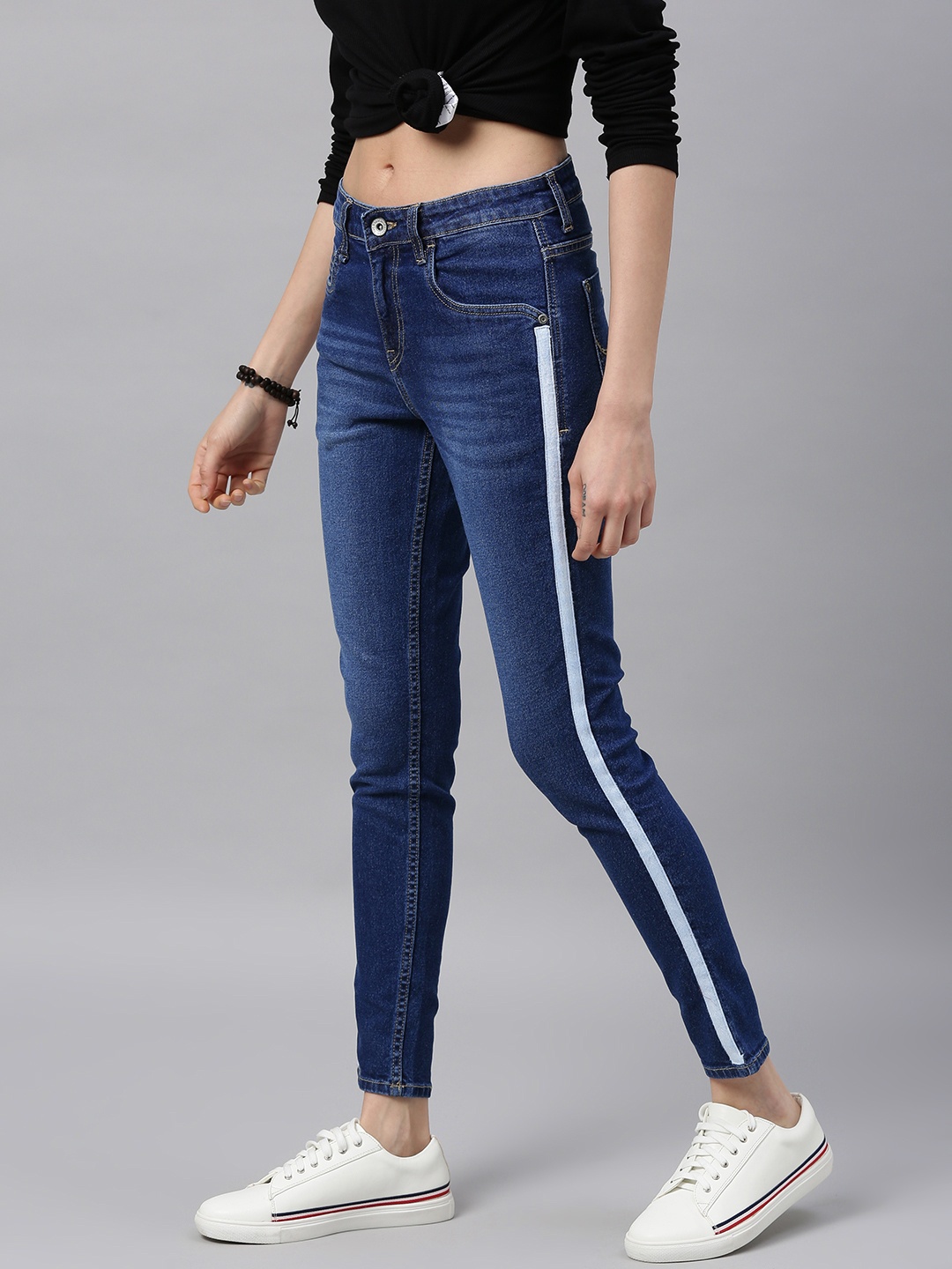 

Roadster Women Blue Skinny Fit Mid-Rise Clean Look Stretchable Jeans with Side Tape