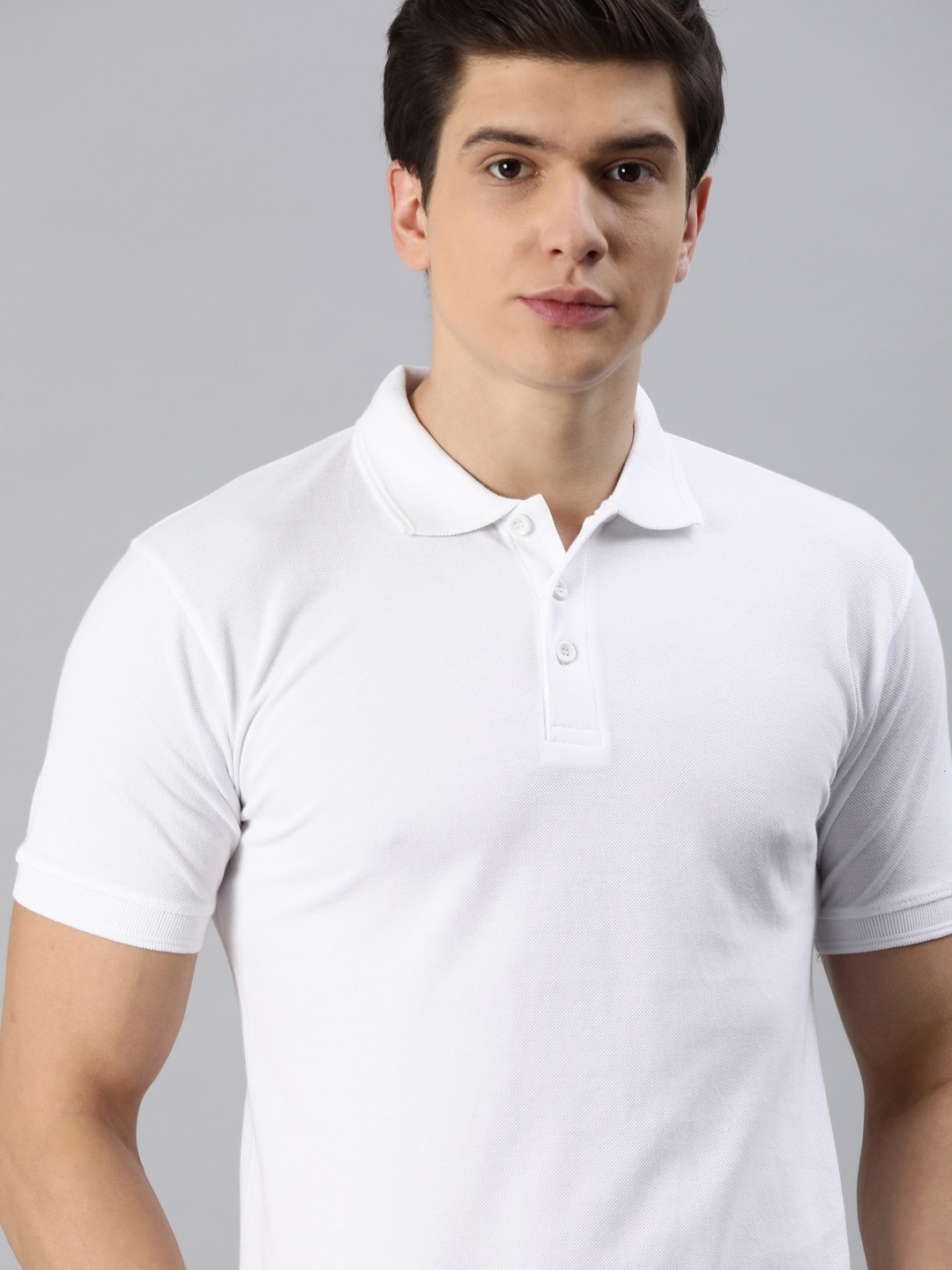 

Roadster Men White Solid Polo Collar T-shirt