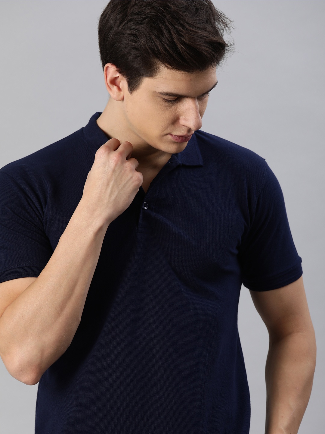 

Roadster Men Navy Blue Solid Polo Collar T-shirt